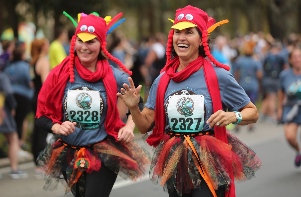 Marathon runners in turkey costumes